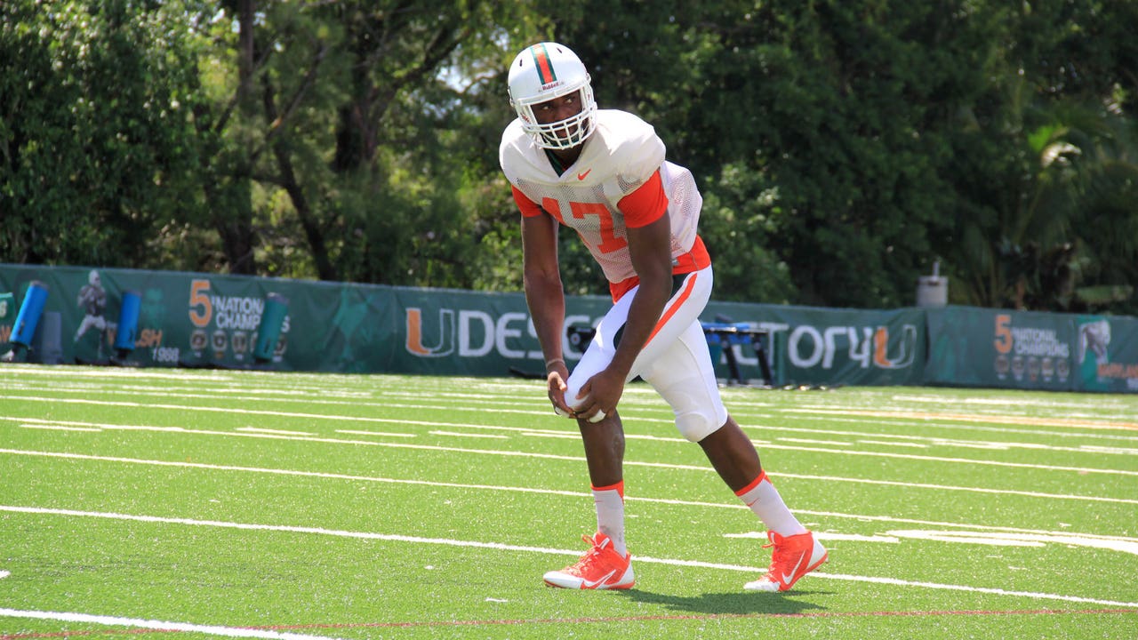 'Canes basketball player Raphael Akpejiori encouraged to give football a shot